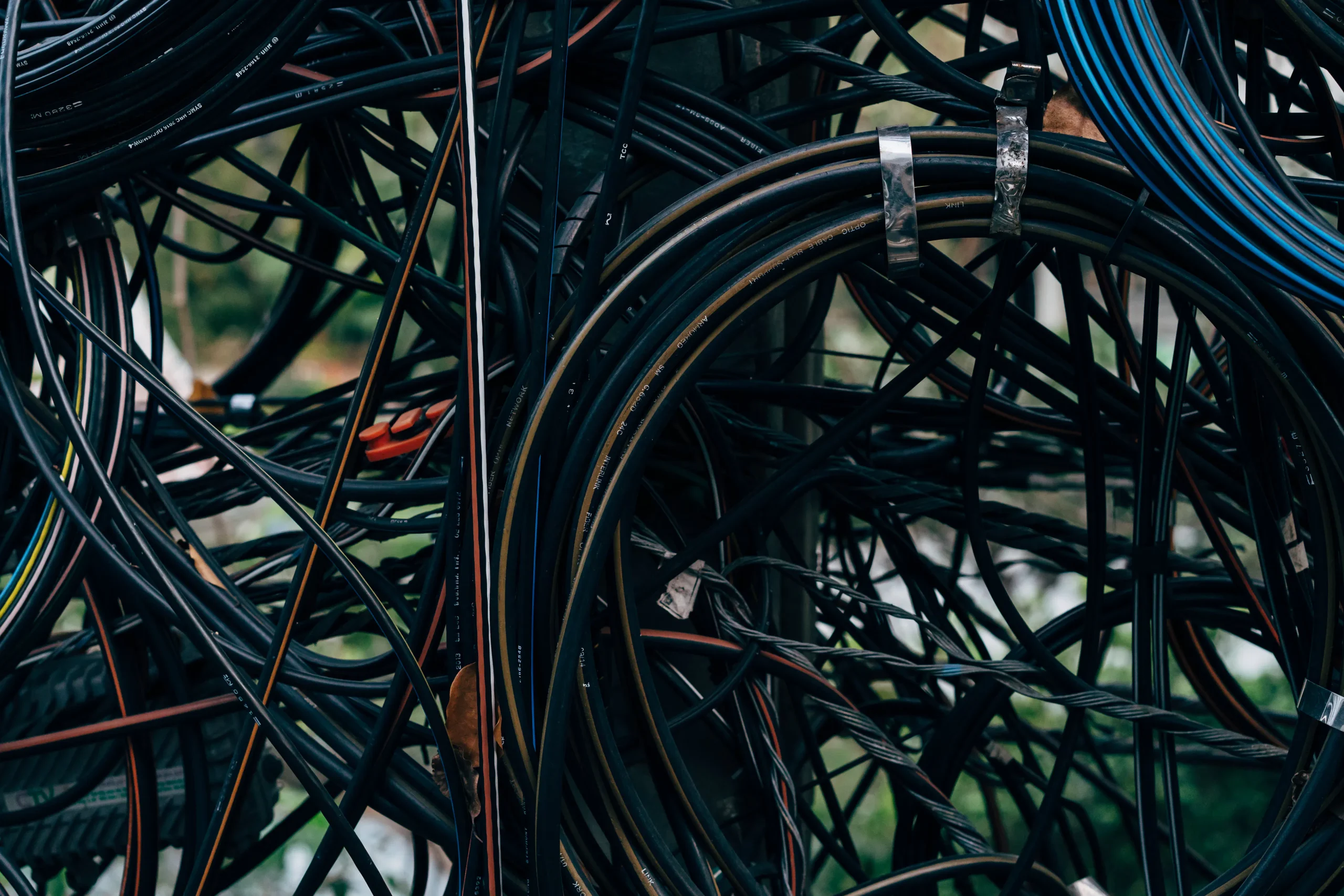 Tangled wires representing a messy content creation workflow needing an AI blog writing platform.