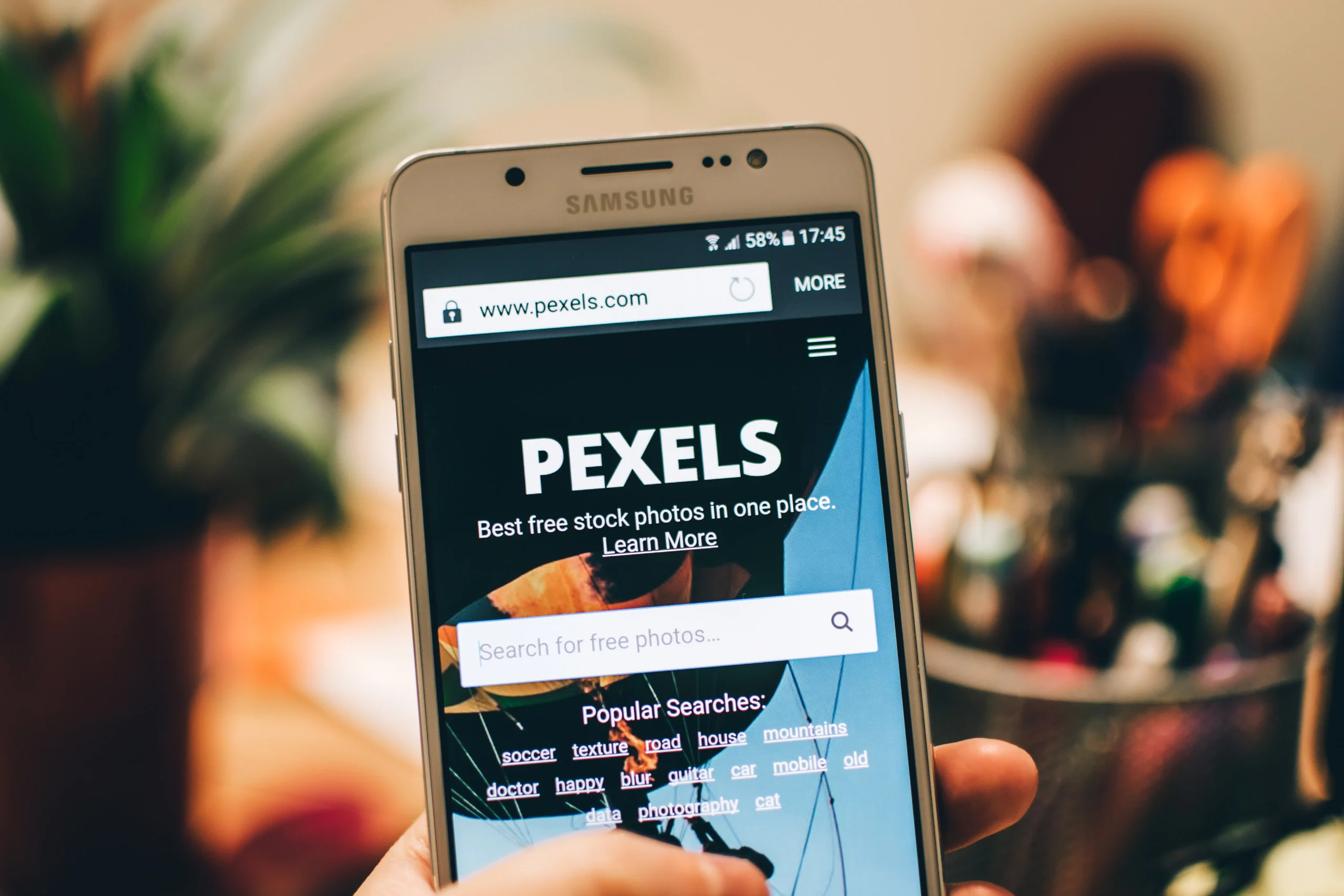 A smartphone showing a search site, useful for optimizing AI drafts and improving content strategy.