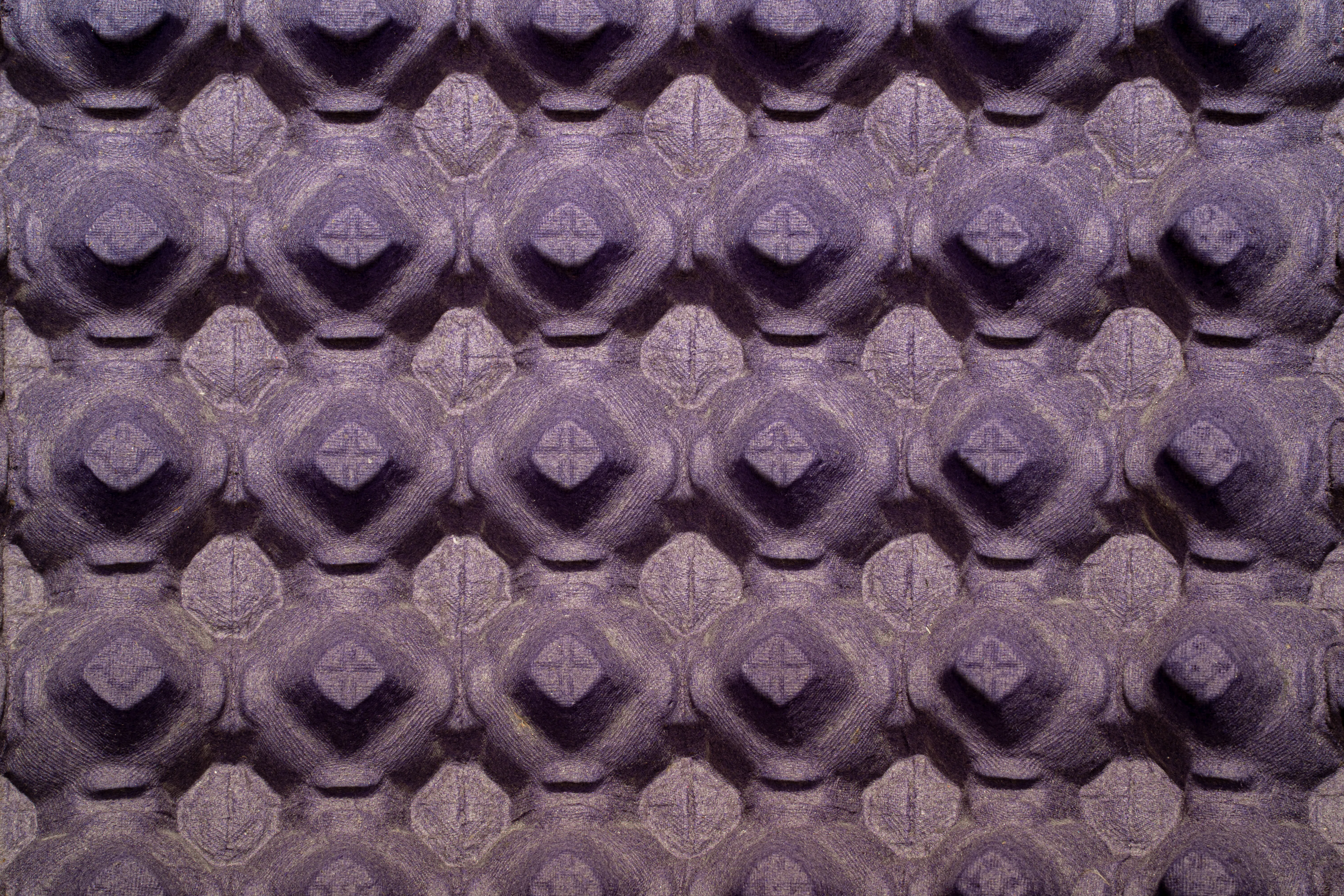 A purple egg carton texture representing structure in an ai powered blog generator workflow.