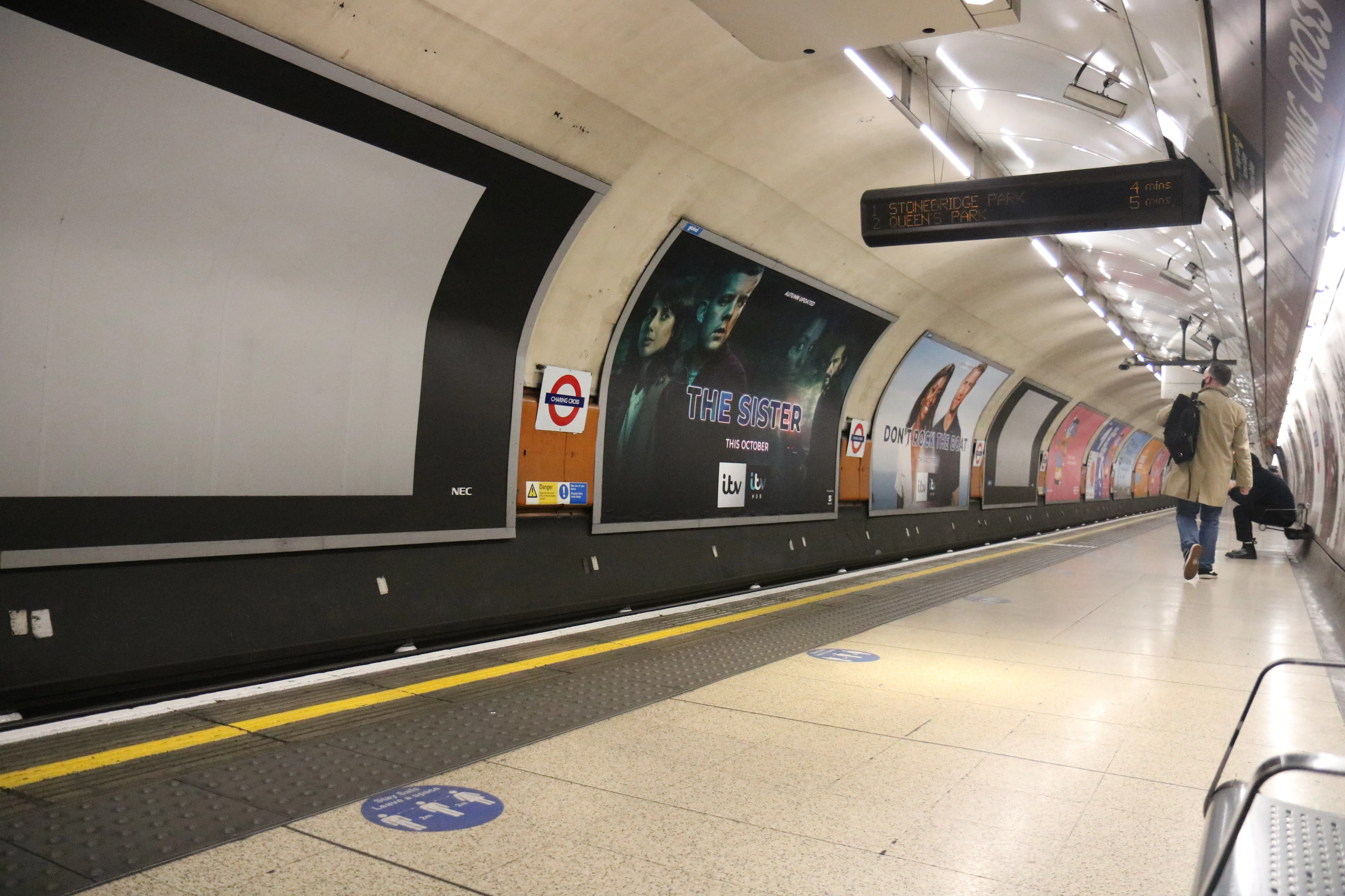 A London Underground station platform illustrating the efficiency of an AI seo article writer for content.