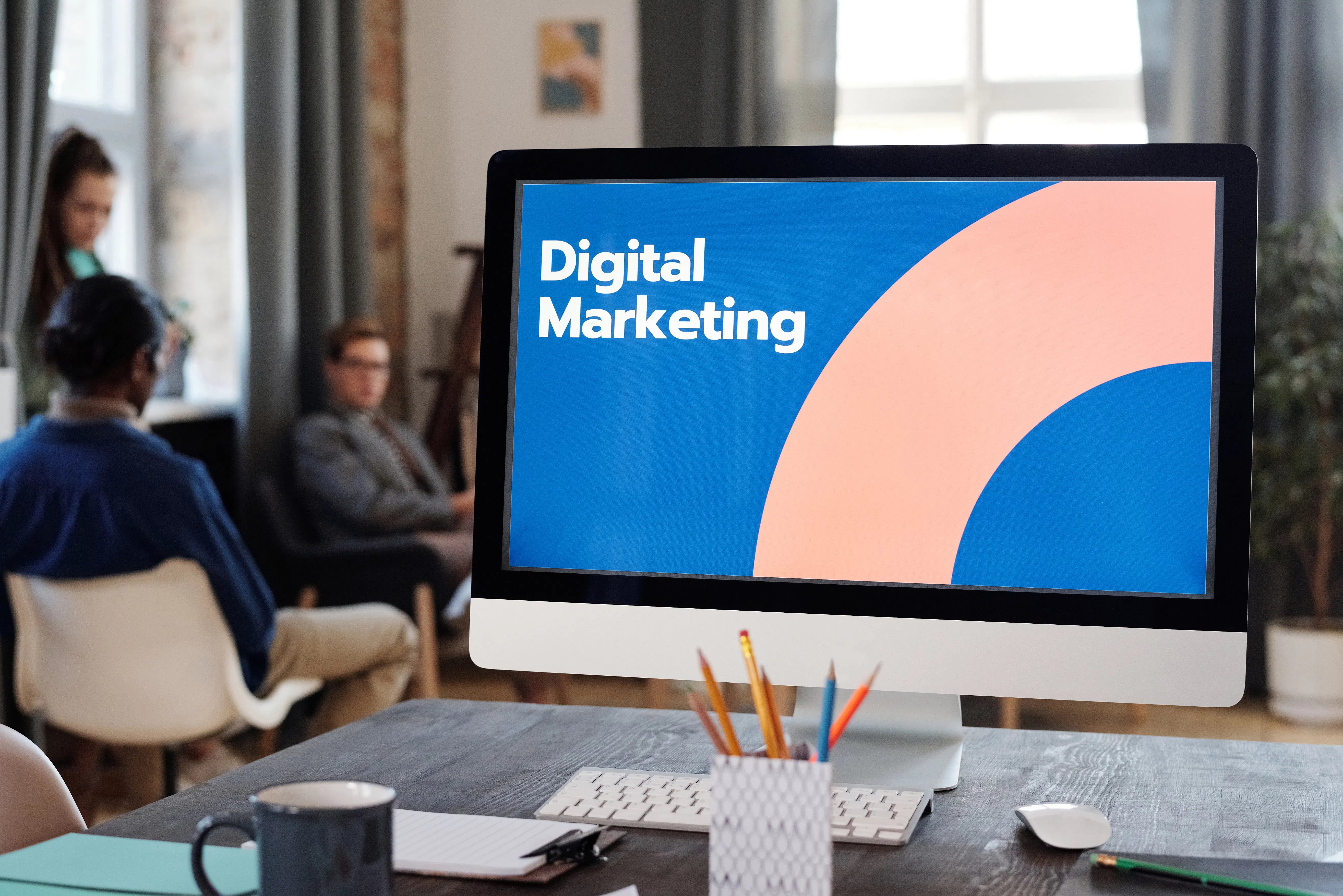 Computer screen showing digital marketing in an office, illustrating AI powered marketing content strategy.