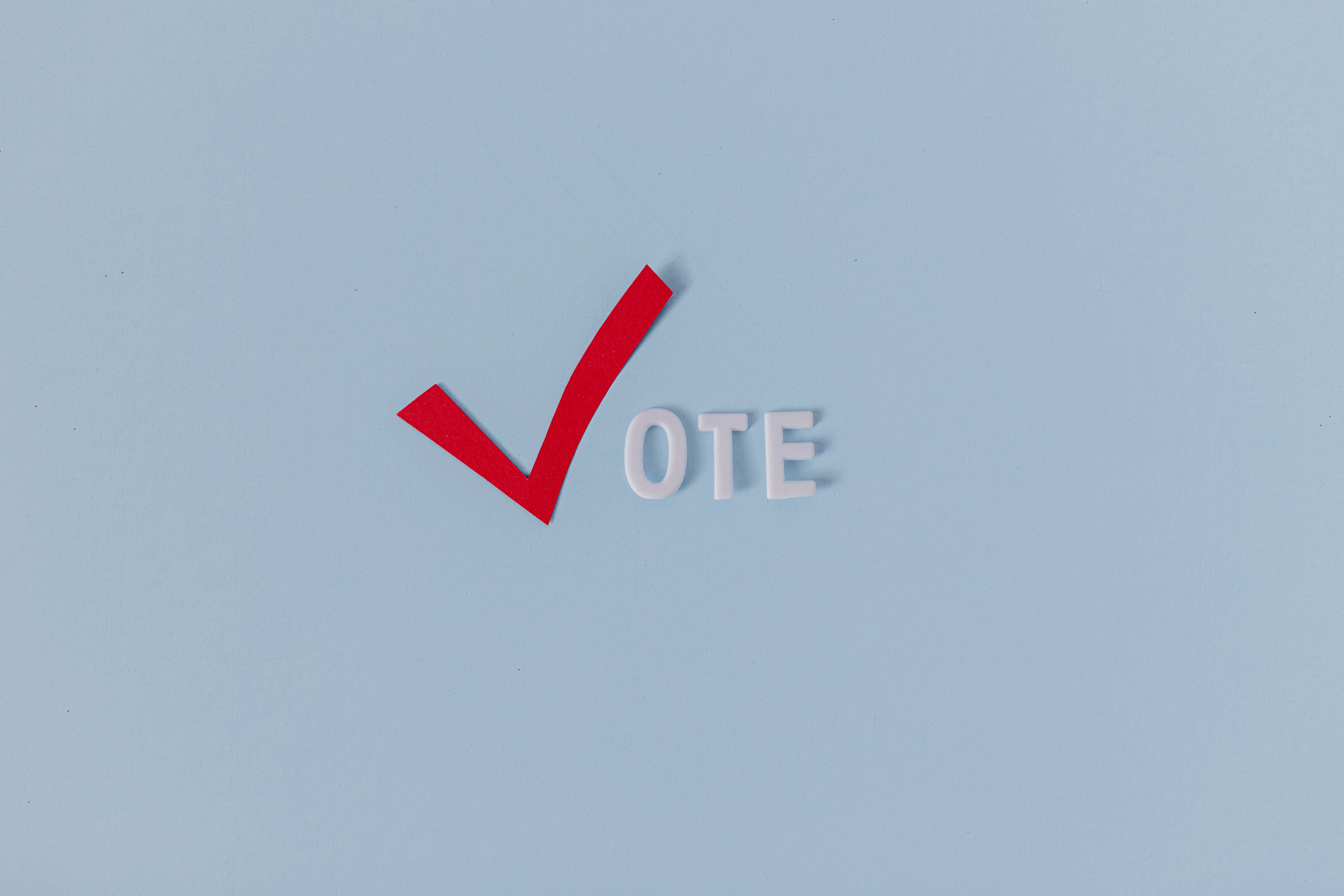 A red checkmark next to the word VOTE for keyword optimization help.