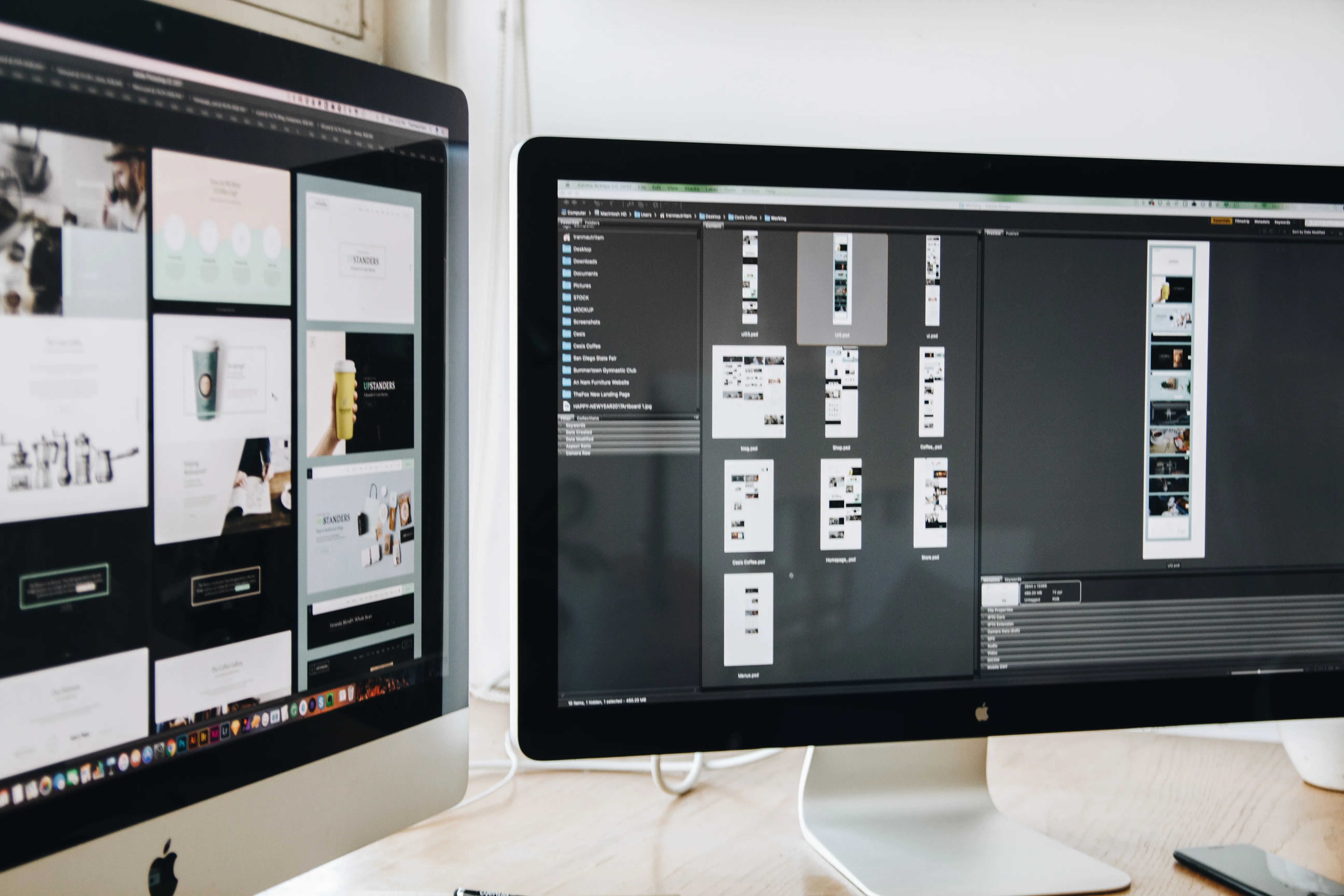 Dual computer monitors displaying digital content layout for answering engine optimization and ranking.