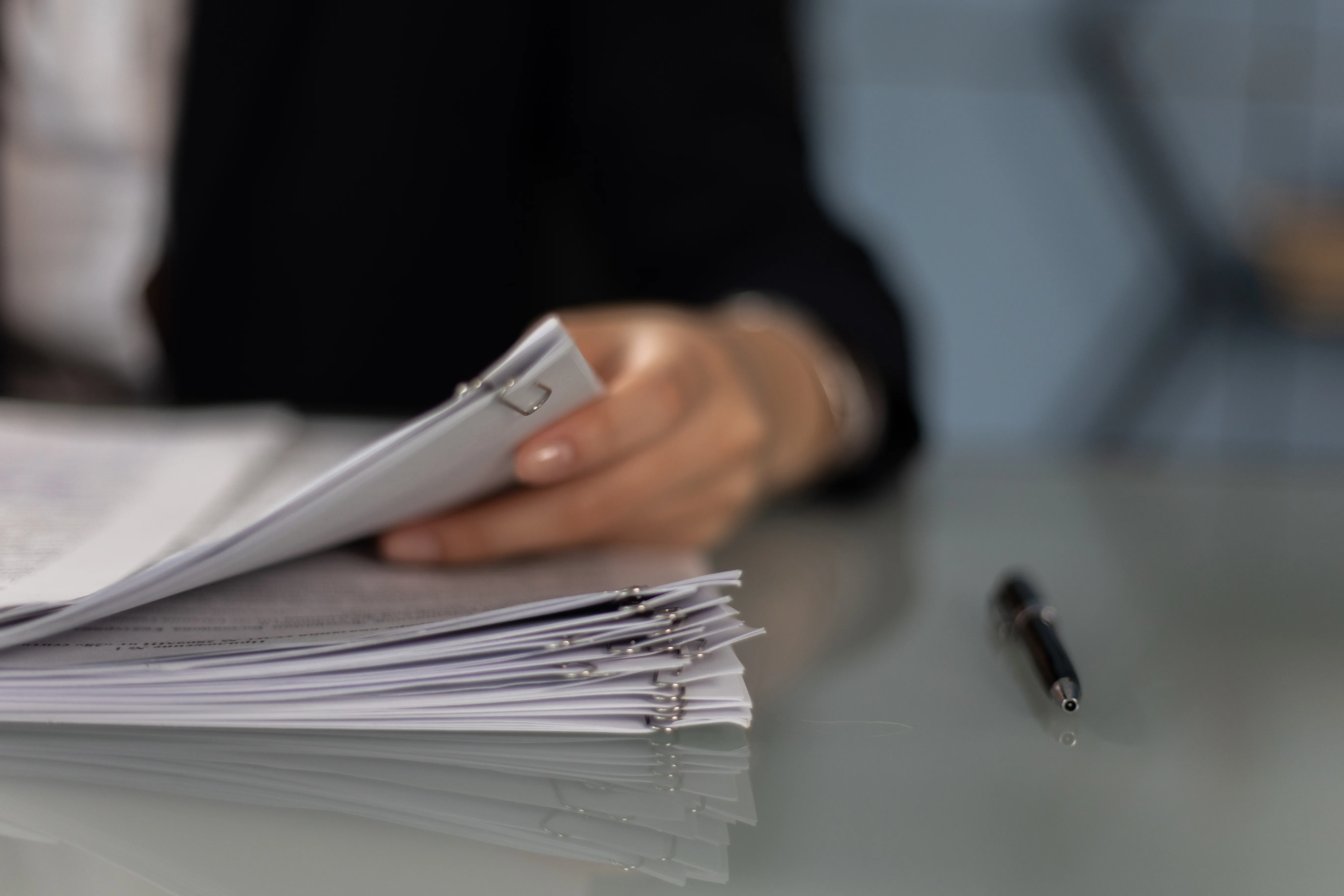 A person reviewing structured documents to optimize for AI search and improve answer engine performance.