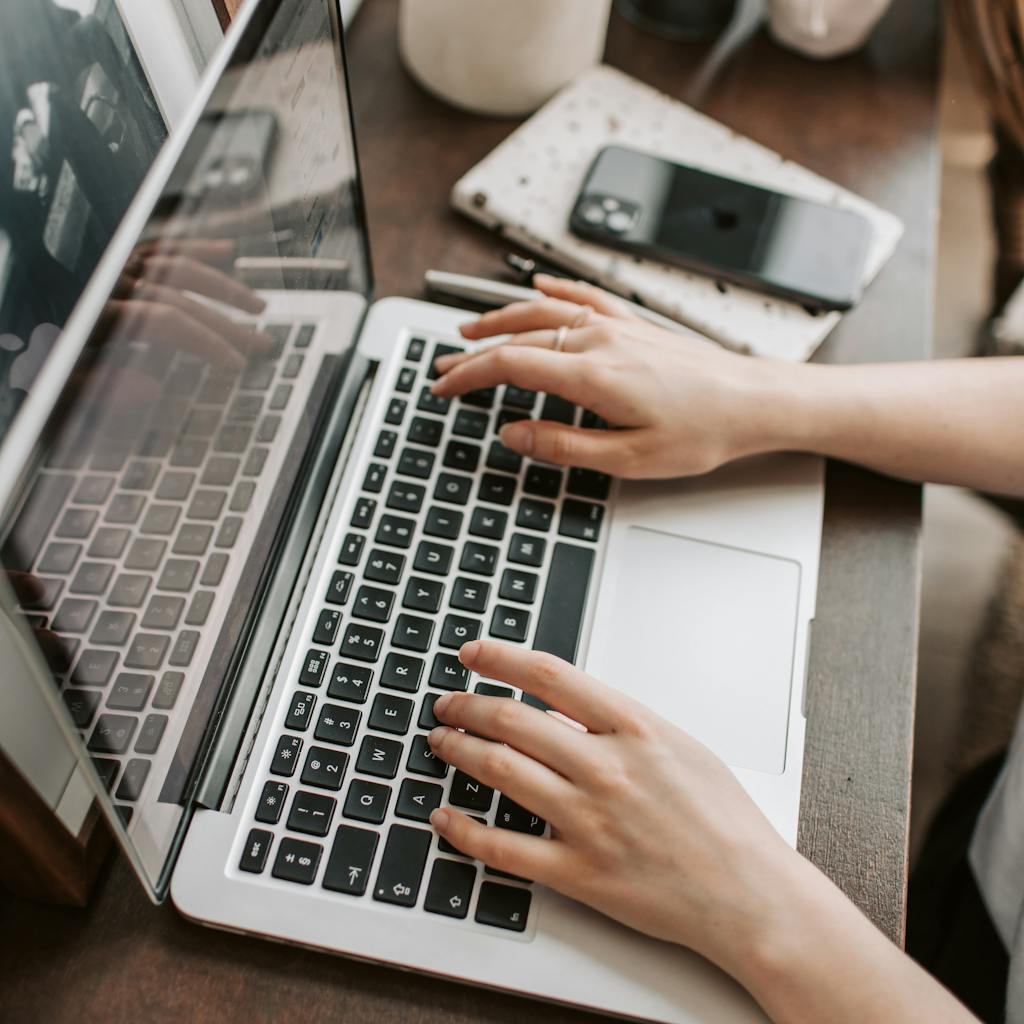 A visually appealing and engaging blog banner featuring a person excitedly reading a blog post on a laptop, surrounded by SEO icons, keyword graphics, and content creation symbols. The overall mood is bright, energetic, and informative.