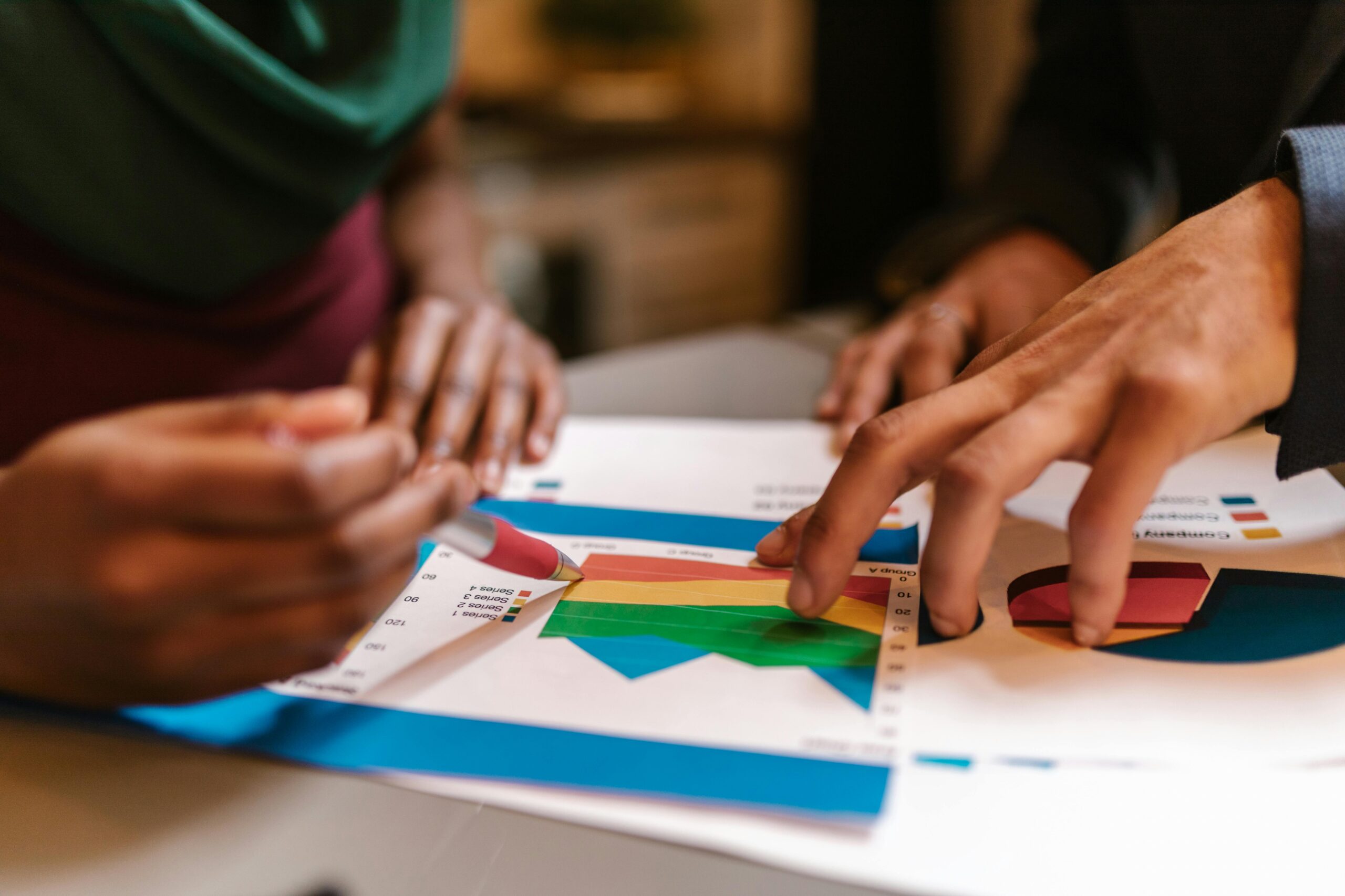 A marketing team analyzing data on a large screen, with AI-powered analytics tools providing insights into campaign performance and ROI.